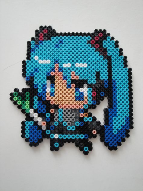 miku hama Miku Pixel Art Grid, Vocaloid Pixel Art Grid, Miku Perler Beads, Hama Beads Anime, Anime Perler Beads, Anime Cd, Anime Perler, Hamma Beads Ideas, Perler Art