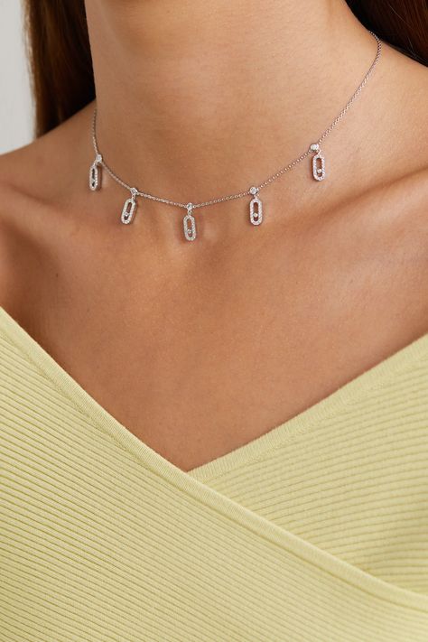 Messika's 'Move Uno' collection is defined by a central diamond which glides freely within a delicate pavé-set charm. The signature design is replicated and showcased in this stunning 'Tassel' choker, which has been handmade from 18-karat white gold. Style yours with an off-the-shoulder top and scarlet lipstick.  Each Messika piece comes with a two-year warranty, which is activated 28 days after purchase. To receive an additional year's warranty, register your piece on Messika's website. Diamond Earring And Necklace Set, Messika Jewelry Aesthetic, Messika Choker, Scarlet Lipstick, Messika Necklace, Messika Move Uno, Minimalist Accessories Jewellery, Messika Jewelry, Gold Diamond Choker