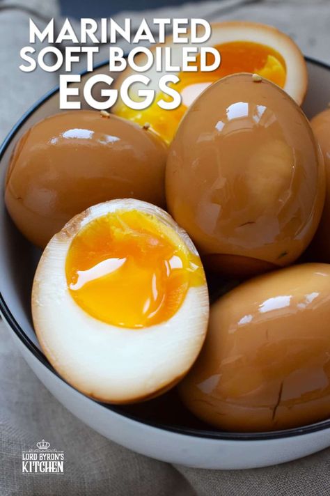 The perfect addition to any piping hot bowl of ramen or spicy noodles, Marinated Soft Boiled Eggs add flavour and texture. The velvety consistency of that golden yellow yolk offers a touch of creaminess and smoothness to soups and noodles. Try chopping a couple of these eggs over steamed rice too! #marinated #asian #softboiled #eggs #soyeggs #korean Breakfast Steak And Eggs, Marinated Eggs, Steak Breakfast, Bowl Of Ramen, Steamed Eggs, Pickled Eggs, Egg Salad Sandwiches, Spicy Noodles, Homemade Pickles