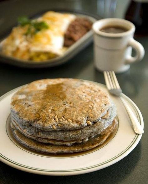 But honestly, there’s one breakfast dish that stands out among them all. They call it the Blue Corn Piñon Pancake. It’s a buttery, sweet, and nutty pancake that incorporates Piñon nuts into the recipe. Served with orange butter and cinnamon syrup, this delectable dish is both a treat and an anytime meal. Blue Corn Pancakes, Mexican Mocha, Corn Pancakes, Orange Butter, Avocado Taco, Cinnamon Syrup, Classic Breakfast, Blue Corn, Nut Recipes