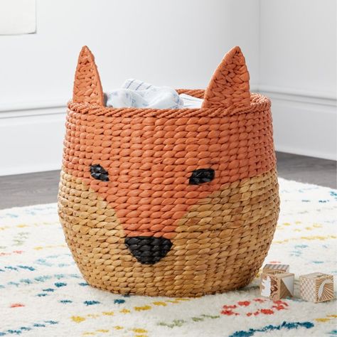 Shop Fox Floor Bin. We don't like to brag, but this Fox Floor Bin just might be our all-time cleverest storage piece. It's woven from real water hyacinth, giving it a lovely natural charm. And with an iron frame, it has the durability you need for the nursery, kids room or playroom. Outdoorsy Decor, Wood Toy Box, Kids Storage Bins, Kids Toy Boxes, Kids Baskets, Fox Nursery, Basket And Crate, Toy Storage Baskets, Toy Bins