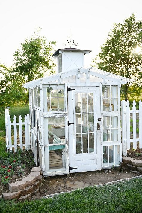 DIY rustic window greenhouse - Take the full tour of this hand built greenhouse made out of antique windows inside & out! White Greenhouse, 1940s House, Diy Cottage, Window Greenhouse, Greenhouse Supplies, Best Greenhouse, Greenhouse Shed, Build A Greenhouse, Home Greenhouse