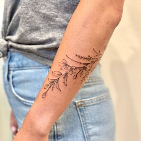 Wildflower Tattoo Ideas, Wildflower Tattoos, Small Friendship Tattoos, Arm Wrap Tattoo, Flower Vine Tattoos, Wrap Around Wrist Tattoos, 50 Tattoo, Wrap Around Tattoo, Cuff Tattoo