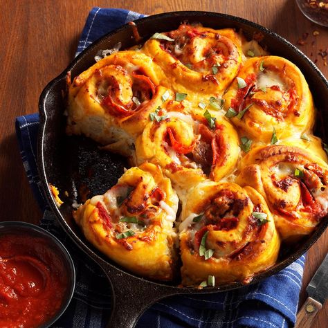 Cheesy Pizza Rolls Recipe -The cast-iron skillet browns these delicious rolls to… Cheesy Pizza Rolls, Pizza Rolls Recipe, Football Foods, Homemade Pizza Rolls, Pizza Roll Recipe, School Lunch Recipes, Cheese Sauce For Pasta, Pizza Roll, Cheesy Pizza