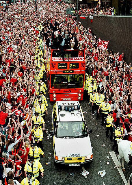 Greater Manchester Police officers policing the treble winning homecoming parade of Manchester United in 1999. It has been estimated over 500,000 people watched the parade. For more information please follow Greater Manchester Police Museum and Archives. To find out more about Greater Manchester Police please visit our website. www.gmp.police.uk You should call 101, the new national non-emergency number, to report crime and other concerns that do not require an emergency response. Always call 99 Iconic Manchester United Photos, Manchester United Treble, Manchester United Line Up, Manchester Is Red, Manchester Police, Manchester Cathedral, Homecoming Parade, Manchester United Team, Manchester United Wallpaper