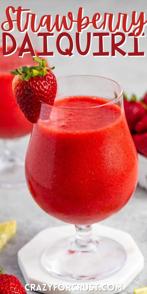 A classic Strawberry daiquiri is made with tons of strawberry flavor and lots of rum - it's the best summer drink and you can even make it a virgin non alcoholic daiquiri! Virgin Daiquiri, Frozen Summer Cocktails, Strawberry Daiquiri Recipe, Frozen Strawberry Daiquiri, Frozen Daiquiri, Best Mixed Drinks, Alcoholic Punch Recipes, Daiquiri Recipe, Fun Summer Drinks