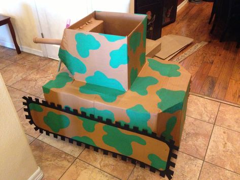 Finished cardboard tank Cardboard Tank, Army Birthday Parties, Military Crafts, Army Crafts, Army's Birthday, Army Party, Christmas Play, Box Houses