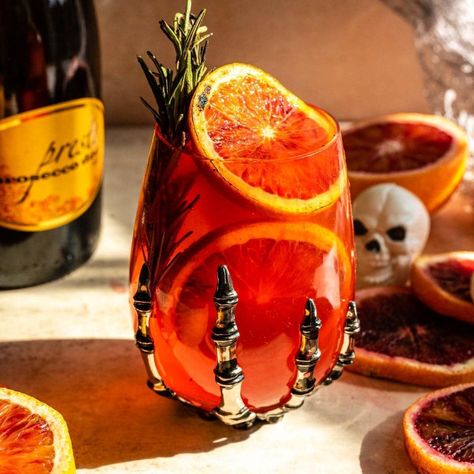 Gomez Morticia, Cream Puff Dessert, Puff Dessert, Halloween Punch, Gomez And Morticia, Blood Orange Juice, Italian Soda, Orange Drinks, Good Whiskey