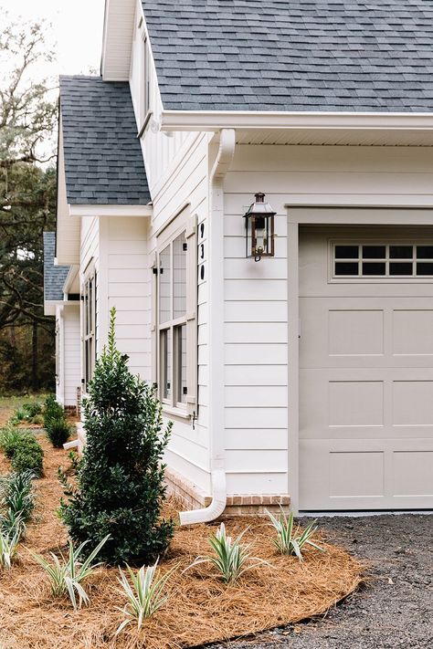 White House With Contrast Trim Exterior, Old Home Exterior Remodel, White Cream House Exterior, Off White And Taupe Exterior, Update Builder Grade Exterior, Shake And Board And Batten Siding, Magnolia Paint Colors Exterior, White And Beige Home Exterior, White House Tan Garage Door