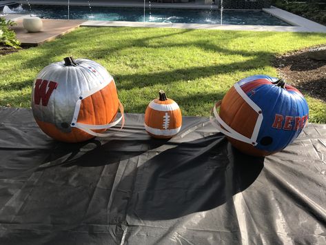 Sport Pumpkin Painting Ideas, Football Pumpkin Decorating, Sports Themed Pumpkins, School Spirit Pumpkin Decorating, Football Carving Pumpkin, Pumpkin Painting Ideas Football, Football Pumpkin Carving, Football Pumpkin, Basketball Pumpkin Painted