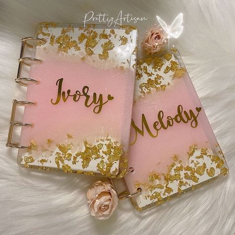 Elevate your decor with this exquisite pink and gold resin craft. Its shimmering hues blend seamlessly, adding a touch of luxury to any space. Resin Notebook Cover Ideas, Resin Diary, Resin Notebook, Crochet Sweater Design, Crystal Clear Epoxy Resin, Pink Cover, Craft Resin, Diy Resin Projects, Custom Bookmarks