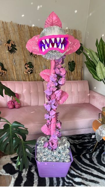 Miranda | DIY Princess | Tropical Barbie on Instagram: "DIY Ultimate Girly Disco Venus Flytrap 🪩💀  If you’re new here I wanted to share this creation I made for Halloween last year🤩 Honestly this isn’t just Halloween decor in my opinion this is 👏year round decor.  I’m so thrilled that Venus now lived in her forever fabulous home with @vintageshowpony .. I mean where else should she be?!??  One year later and this honestly still might just be my favorite thing I’ve ever freakin made 🤩💖 . . . #makeitwithmichaels #michaelscraftstore  #diyhalloweendecorations #diyhalloweendecorations #discoballdecor #halloweendecor #halloween #pineappleprincesscreations #halloweendiy #halloweenlife" Tropical Barbie, Venus Flytrap, Michaels Craft, One Year Later, Princess Diy, Venus Fly Trap, Pumpkin Ideas, Instagram Diy, Round Decor