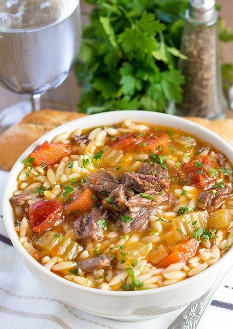 This recipe for Crock pot Oxtail Orzo Soup makes a hearty,  scrumptious, dish that's flavorful and full of tender meat that just melts in your mouth! #slowcooker #orzo #soup #comfortfood #oxtail #slowcookerrecipes #lunchideas #italianfood #italianrecipes #pasta #pastadishes #pastarecipes #crockpot Slow Cooker Oxtail, Easy Crockpot Soup, Slow Cooked Lamb Shanks, Oxtail Soup, Crockpot Chicken Breast, Oxtail Recipes, How To Cook Orzo, Tender Meat, Orzo Soup