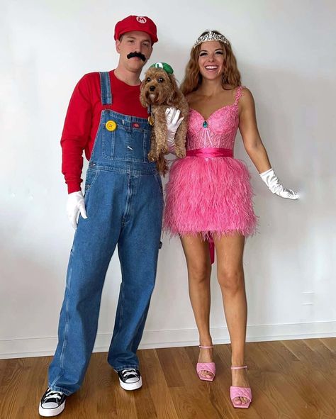 52 Hottest Halloween Couple Costumes You Have to Recreate For 2023 Engagement Halloween Costume, Halloween Costume Ideas Duo Couple, Couples Concept Costumes, Hottest Couple Halloween Costumes, Creative Couples Costumes 2023, Couples Character Costumes, Modest Couple Halloween Costumes, Teenage Couple Halloween Costumes, Tinkerbell Couple Costume