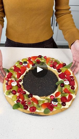 1.2M views · 10K reactions | Easy holiday dessert | Easy holiday dessert I make a sugar cookie wreath. | By Rick's Friend Justine | Facebook Fruit Pizza Christmas Wreath, Fruit Pizza Wreath, Christmas Fruit Pizza, Sugar Cookie Wreath, Vanilla Jello, Justine Kameron, Cookie Wreath, Easy Holiday Dessert, Cookie Holiday