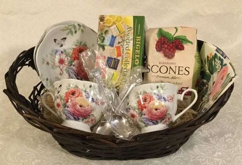 Tea Party Gift Basket, Tea Basket Ideas, Tea Gift Basket Ideas Diy, Tea Themed Gift Basket, Vintage Gift Baskets, Tea Basket Gift Ideas, Tea Cup Gift Basket, Kitchen Tea Gift Ideas, Thrifted Gift Basket