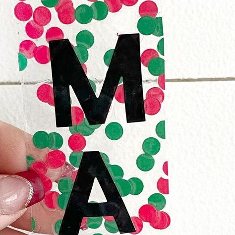 Susan McInnis on Instagram: "📕DIY CHRISTMAS BOOKMARK📕 This would be super cute to gift with a book! Our elf brought a book today so I included this with it. Here’s how to make: 📕Hole punch colored paper of your choice 📕Arrange circles in the shape of a rectangle 📕Place packing tape sticky side down on top of the circles 📕To personalize, add letter stickers to sticky side (you can also write name on the outside at the end with sharpie if that’s easier) 📕Place another piece of packing tape on top (sticky sides facing each other) 📕Trim sides 📕Punch hole towards the top 📕Fold a ribbon in half and loop it to make a bookmark tail 📕Enjoy your customized book mark! You could do favorite colors, character stickers, nicknames, or anything really! #bookmark #easydiy #christmasdiy #personal Make A Bookmark, Christmas Bookmark, Character Stickers, Camp Crafts, Christmas Bookmarks, Packaging Tape, Book Markers, A Rectangle, Letter Stickers