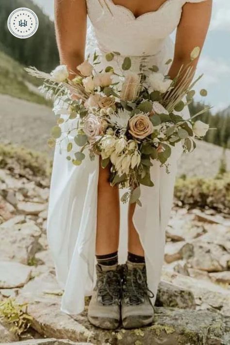 Get inspired by this hike elopement with fabulous views in the Elk Mountains at Crater Lake. Plan a Colorado elopement with stunning views! Photo by Aubrey Beth Photography. Mountain Bridal Bouquet, Mountain Elopement Bouquet, Mountain Elopement Shoes, Wedding Hiking Boots For Bride, Mountain Wedding Shoes, Wedding Dress With Hiking Boots, Summer Elopement Ideas, Hiking Elopement Photos, Mountain Wedding Photoshoot