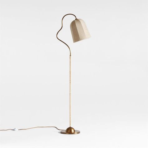 Jake Arnold designed this floor lamp to add soft illumination to a space. Stretched over the graceful flared dome frame, linen-blend filters light softly. Burnished brass-finished metal accents and the rattan-wrapped stem play with materiality while enhancing the lamp's warm, organic presence. We love Allegra next to a sofa or armchair where it can provide the perfect glow.Jake Arnold, interior designer and co-founder of The Expert, has a fresh talent for mixing insider-worthy details and real-l Bedroom Lighting Floor Lamp, Leather Lamp, Gooseneck Floor Lamp, Jake Arnold, Austin House, Desert House, Spanish Style Home, Adjustable Floor Lamp, Task Floor Lamp