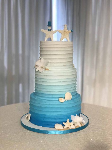 Malibu Blue Ombre Malibu Blue Wedding, Wedding Cake Blue, Unusual Wedding Cakes, Beach Theme Wedding Cakes, Tropical Wedding Cake, Shell Wedding, Ruffle Wedding Cake, Vegan Wedding Cake, Destination Wedding Caribbean