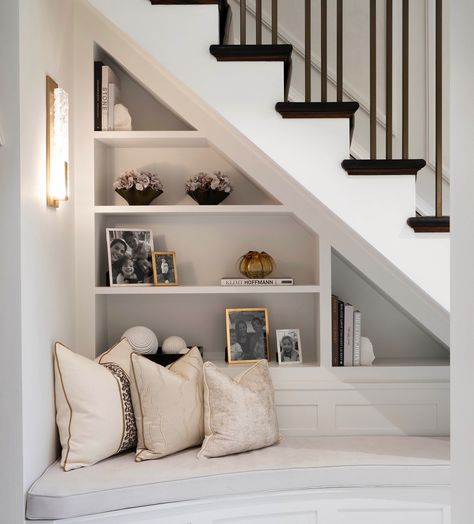 Book Storage Under Stairs, Under Stairs Reading Area, Bespoke Under Stairs Storage, Hall Under Stairs, Under Stairs Storage Living Room, Under Stairs Joinery, Under Stairs Bookshelves, Book Shelves Under Stairs, Books Under Stairs