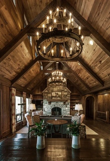 Triple Tier Sorrento Chandeliers in a mountain home. Hunting Lodge Chandelier, Mountain House Chandelier, Mountain Home Chandelier, Mountain Home Lighting, Citrus Bedroom, Mountain Homes Interiors, Iron Chandelier Rustic, Cabin Chandelier, Cozy Rustic Living Room