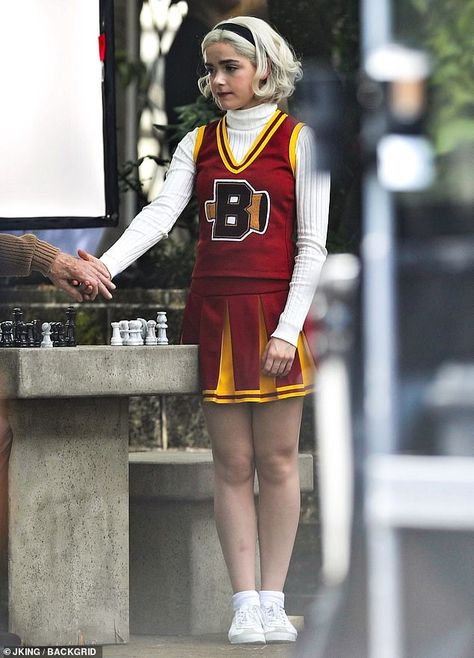 Kiernan Shipka dons cheerleader uniform on the set Of Chilling Adventures of Sabrina in Vancouver | Daily Mail Online Dark Academia Aesthetic Outfit Woman, Maroon Shirt Outfit, Sabrina Costume, Sabrina Spellman Outfit, Sabrina Spellman Style, Dark Academia Aesthetic Outfit, Sabrina Witch, Maroon Colour, Chilling Adventures Of Sabrina