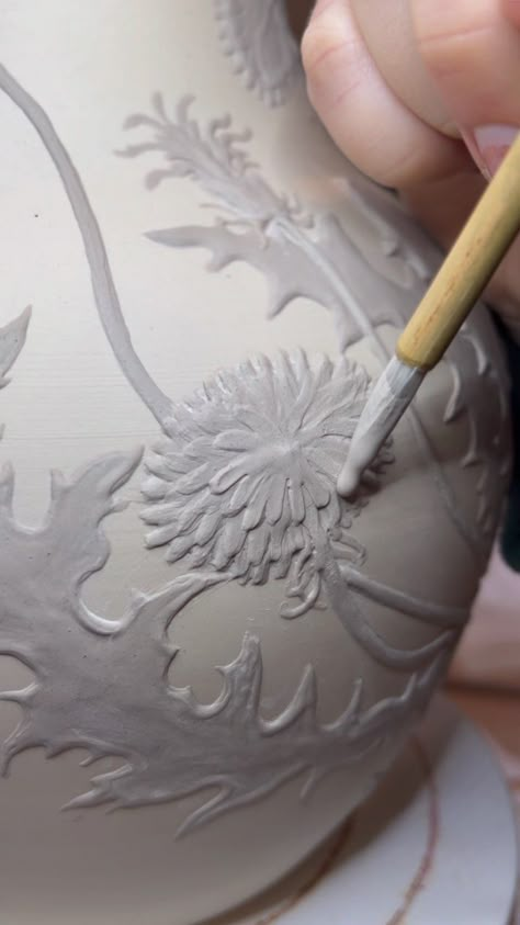 Little Garden Pottery 🌿🐝 on Instagram: “Painting a Luna moth with underglazes :) So fun to add color to this bright white porcelain! 🌙 ✨💕 #handmadepottery #pottery #ceramics…” Slip Clay Decoration, Slip Trailing Ceramics, Slip Painting Ceramics, Pottery Slip Decoration, Slip Decoration Pottery, Dandelion Pottery, Ceramic Sketchbook, Clay Lights, Dandelion Vase