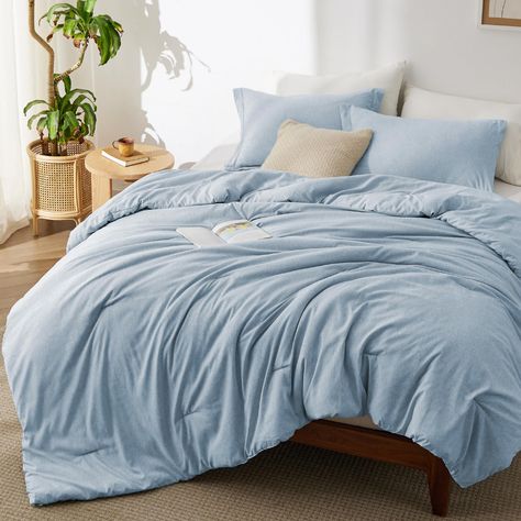 PRICES MAY VARY. Extra Soft: With Bedsure's unique brushing technique, this Bedsure full comforter delivers an incredible softness that is satisfyingly comfortable on skin. Its premium microfiber filling provides a cloud-like comfort for coziness year round. Exquisite and Simplistic Style: This comforter is cationic dyed to achieve a subtle yet elegant dual-color noise effect, and can easily help your little one get cozy. Comforter Duvet Insert: With four corner loops at each of the corners, this bedding set can be used as an all-season comforter or as a cozy year-round duvet insert. Easy to Maintain: This Bedsure bedding comforter set is easy to maintain. Simply machine wash in cold water on a gentle cycle for a like-new restoration. What You Can Get: This Bedsure full comforter set for i Light Blue Comforter, Light Blue Bedding, King Size Comforter, Dorm Bedding Sets, Full Size Comforter, Full Comforter Sets, King Size Comforter Sets, Blue Bedding Sets, Blue Comforter