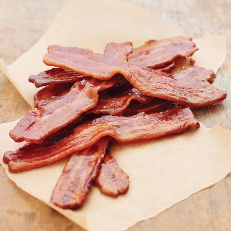 Maple syrup is baked onto these thickly cut slices of bacon, creating a candy-like coating. It's a sweet and savory match that's ideal for a weekend breakfast or brunch. Maple Candied Bacon Recipe, Candied Bacon Recipe, Maple Candy, Bacon Recipe, Cooking Bacon, Breakfast And Brunch, Candied Bacon, Maple Bacon, Bacon Recipes