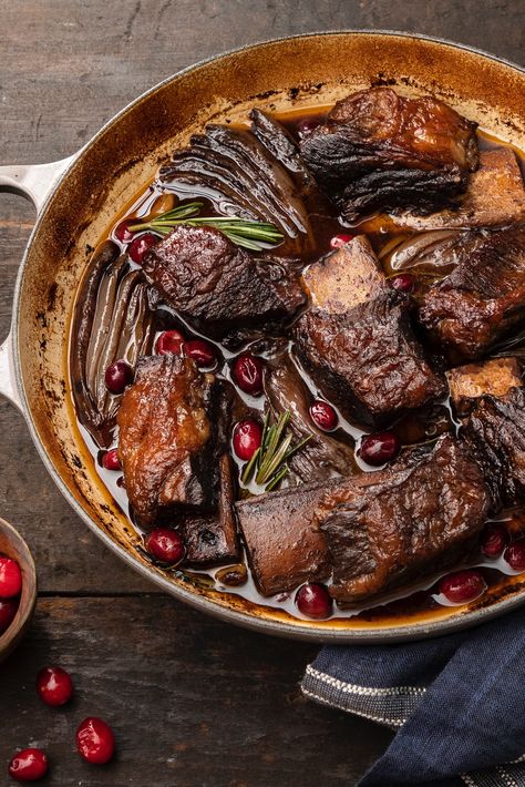 The ultimate comfort food, Balsamic Rosemary Braised Short Ribs with Cranberries become meltingly tender when braised for hours in a bath of red wine and balsamic vinegar. They would make the perfect meal for a cozy, Sunday supper, especially when served with buttery mashed potatoes to soak up every bit of the sauce. Le Creuset Braiser, Cast Iron Braiser, Buttery Mashed Potatoes, Culinary Techniques, Braised Short Ribs, Frozen Cranberries, Beef Short Ribs, Braised Beef, Enameled Cast Iron