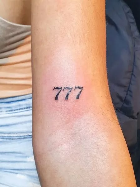 Meningful 777 Tattoo 777 Tattoo Meaning, Tattoo On Face, Font Tato, 777 Tattoo, Tato Minimal, Petit Tattoo, 4 Tattoo, Fire Tattoo, Tattoo Font