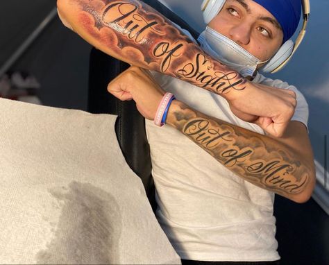 Forarm Sleeve Men, Out Of Site Out Of Mind Tattoo, Westside Tattoo Design, Against All Odds Tattoo Design, Front Arm Tattoo Men Sleeve, Name Sleeve Tattoos For Men, Name Arm Tattoo Men, 4 Arm Tattoos Men, Forearm Tattoo Writing