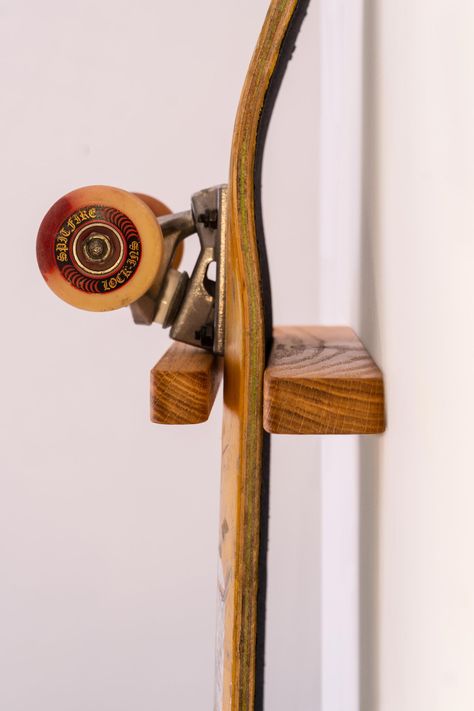 Rack And Ride · Stylish and Sustainable Oak Wall Mounts Skateboard Holder Wall Racks, Skateboard Mounted On Wall, Skateboard Wall Mount Diy, Skateboard Decoration Ideas, Skateboard Rack Wall Mount, Hanging Skateboards On Wall, Guitar Holder Wall Diy, Skateboard On The Wall, Skateboard Racks Diy