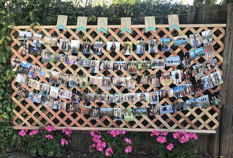 photos attached to twine with clothes pins tied to trellis is a fun way to display photos for an outdoor grad party!! Trellis Photo Display, Lattice Photo Display, Lattice Picture Display, Memory Lane Photo Display Birthday, Graduation Party Picture Display Target, Outdoor Grad Party, Pallet Picture Display Graduation, Wooden Pallet Picture Display Graduation, Way To Display Photos