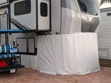 Staying warm in an RV during winter is challenging. However, adding skirting to your rig can help. Here are 5 RV skirting ideas to consider. RV Skirting Ideas: 5 Ways to Skirt Your Camper for Insulation #fulltimerv #fulltimerving #rvfulltime #diyrvskirting #rvskirting #wintercamping Camper Underpinning Ideas, Rv Skirting Ideas Diy, Rv Skirting, Rv Gear, Rving Full Time, Insulation Board, Used Rv, Diy Rv, Rv Lifestyle