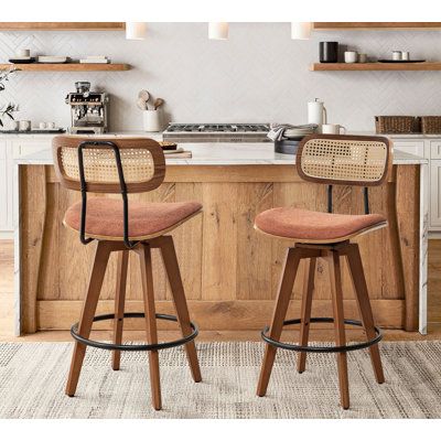 These modern swivel rattan barstools will elevate your space in a flash! The armless design provides a sleek silhouette, making it perfect for compact spaces or tucking neatly under counters. These barstools have legs made of bamboo, and you can adjust the balance of the counter stools by turning the nuts at the bottom of the legs! They're stylish and functional, and they're sure to bring a touch of elegance to your space. With a 360° swivel seat mechanism, you'll love the dynamic seating experi Mcm Counter Stools, Wood Swivel Counter Stool, Designer Bar Stools, Wood Counter Stools, Swivel Counter Stools, Counter Height Bar Stools, Bar Counter, Swivel Seating, Swivel Bar Stools