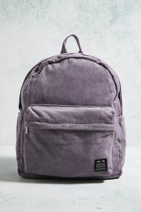 Staple utility backpack in a soft, skinny corduroy fabrication. Zip-up design with a grab handle to top, two shoulder straps and an external zip-up pocket. Complete with a woven logo tab. Urban Outfitters Backpack, Utility Backpack, Corduroy Backpack, Zip Up, Plum, Latest Fashion, Urban Outfitters, Zip Ups, Man Shop