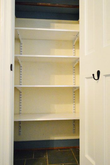 Who Needs Coats When You Can Have Toys? | Young House Love - I need to put shelves in our game closet Hall Closet Shelf Ideas, Coat Closet To Linen Closet, Toy Closet Shelves, Rubbermaid Shelving Ideas, Hall Closet Toy Storage, Toy Closet Shelving Ideas, Turn A Coat Closet Into A Pantry, Track Shelving Closet, Adding Shelves To Closet