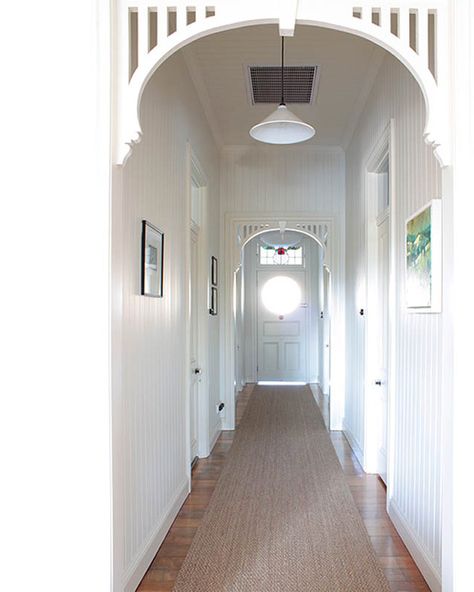 #Hallway.  Love the #white-timber -panelling throughout and #seagrass -runner – so perfect here. Seagrass Runner, Queenslander Renovation, Queenslander House, Hallway Inspiration, Edwardian House, Timber Panelling, Hallway Designs, Foyer Decorating, Entry Hallway