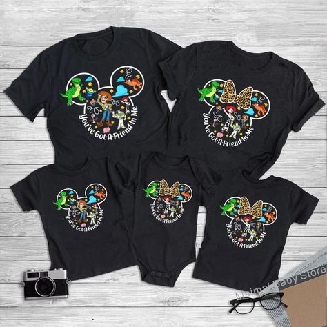 Make your Disneyland 2024 trip a real blast with these new Toy Story matching Disney family shirts! Featuring everyone's favorite characters - Woody, Buzz, Mickey & Minnie - these comfy tees are bursting with fun and "You've Got a Friend In Me" vibes. Perfect for adults, kids, and the whole crew! Free Shipping! Hashtags:  #disneyfamily #di#disneyvacation #matchingfamilyshirts #toystory #toystory4 #buzzlightyear #woody #mickeymouse #minniemouse #disneyfun #disneystyle #familyshirts #freeshipping Family Vacation Outfits, Toy Story Shirts, Me Vibes, Disneyland 2024, Family Disney Shirts Matching, Toy Story Shirt, Disney Family, Shirts Funny, Baby Store