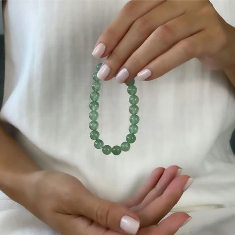 Embrace the calming energy of green aventurine. 💚✨ This beautiful crystal promotes balance and harmony, bringing luck and abundance to your life. 🌿 . . . . . . . . . #GreenAventurine #CrystalHealing #WellnessJourney #CrystalMagic #HolisticHealing #MindBodySpirit #EnergyHealing #NatureInspired #PositiveVibes #GoodFortune Content Hacks, Green Crystal Bracelet, Green Aventurine Bracelet, Crystals Bracelets, Aventurine Bracelet, Aventurine Jewelry, Green Aventurine Stone, Crystal Vibes, Green Aventurine Crystal