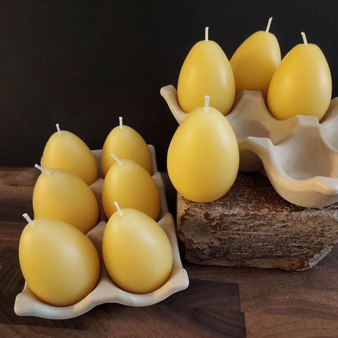 6 beeswax egg candles nestled in a handmade ceramic egg carton. Available in person at the Mill Valley Makers Market this weekend. Egg Candle, Ceramic Egg, Mill Valley, The Mill, Egg Carton, Milling, Handmade Ceramic, Handmade Ceramics, This Weekend