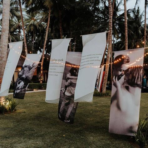 Oh so stunning ✨ We love the romantic feeling provided by incorporating poems and couple's pre-wedding pictures printed on fabric. Such a… Couple Photos Wedding Decor, Fabric Decor Wedding, Wedding Fabric Backdrop, Photo Gallery Wedding Decoration, Photo Corner Wedding, Wedding Photo Corner, Wedding Photo Decor, Photo Wall Wedding, Photo On Fabric