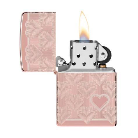 Treat your sweetheart - or yourself - to this luxurious and lovable High Polish Rose Gold lighter. The repeating heart design wraps the entire surface using our Laser 360° process and features a bold heart on the lighter's face. Comes packaged in a gift box. For optimal performance, fill with Zippo lighter fuel. Genuine Zippo windproof lighter with distinctive Zippo "click" All metal construction; windproof design works virtually anywhere Refillable for a lifetime of use; for optimum performance Cool Lighters, Windproof Lighter, Zippo Lighter, Puff And Pass, Gold Light, Heart On, Knick Knacks, Cool Items, Heart Design