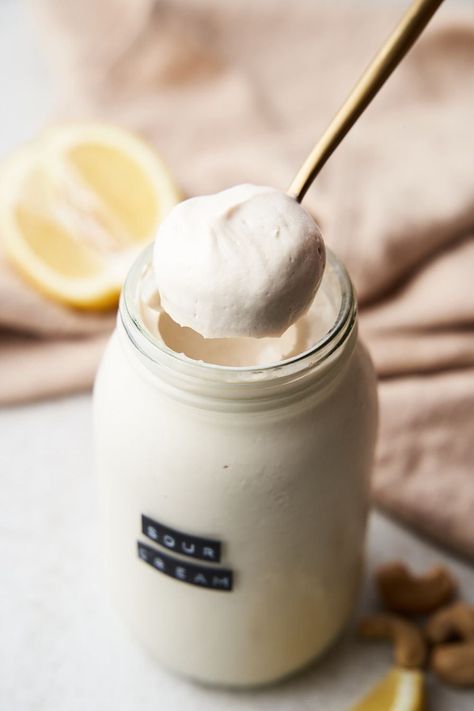 This dairy-free sour cream recipe is a thick, rich, and tangy replacement for regular sour cream. Whether you're plant-based or just want to cut down on milk products, enjoy this condiment with burritos, tacos, chilis, soups, and more! Made from a base of cashews, it is made tangy from lemon juice or apple cider vinegar. Try this easy recipe to serve with dinner tonight! #dairyfreesourcream #vegansourcream #cashewcream Dairy Free Sour Cream, Vegan Heavy Cream, Vegan Fish And Chips, Sour Cream Recipe, Gluten Free Mug Cake, Vegan Condensed Milk, Sour Cream Substitute, Df Recipes, Zesty Salad