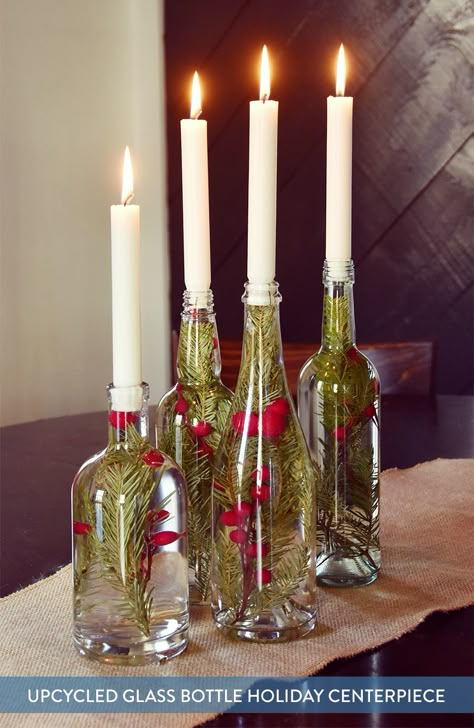 We're halfway through December, it's time to pick out a centerpiece! Try this super easy candle centerpiece that uses upcycled bottles and colorful berries. Simple Candle Centerpieces, Glass Bottle Centerpieces, Upcycled Christmas, Bottle Centerpieces, Candle Centerpiece, Glass Bottle Crafts, Holiday Centerpieces, Christmas Centerpieces, Christmas Table Decorations