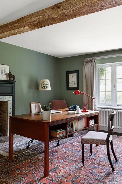 [h2]Study[/h2] Walls in Farrow & Ball’s ‘Card Room Green’ set off the darker shade used on the restored chimneypiece – ‘Obsidian Green’ by Little Greene. The Persian rug is from Lassco. Pamono supplied the Fifties desk. Living Room Farrow And Ball, Card Room Green Farrow And Ball, Card Room Green, Modern Living Room Design Ideas, Card Room, Modern Living Room Design, Room Green, Living Room Design Ideas, Farrow And Ball