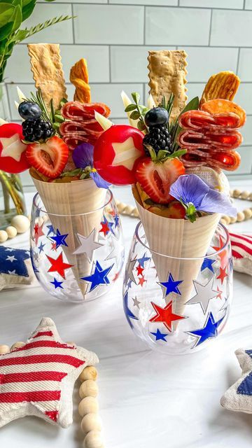 The Board Loon | Kelsey on Instagram: "✨Patriotic Charcuterie Cones✨ I love a good charcuterie cone - they can be so versatile! Served in some stemless wine glasses I got from @walmart ❤️💙🤍🧀 When building a charcuterie cup or cone, the key is skewering! I used bamboo skewers for height. Also how cute is that @babybelus with the star cut out!? . Have a good rest of the weekend and don’t forget why we have this “long weekend”. Take some time to honor & remember all those who gave the ultimate s Charcuterie Cup, Charcuterie Cones, Star Cut Out, Charcuterie Inspiration, Bamboo Skewers, Patriotic Party, Patriotic Holidays, Cheese Plate, Stemless Wine Glasses