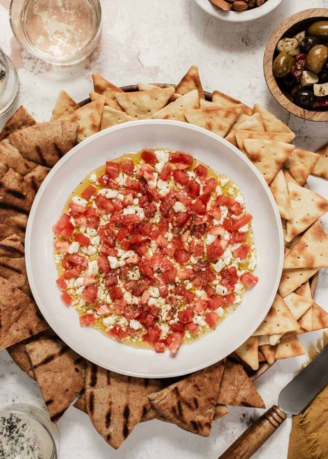 A quick and easy feta tomato dip appetizer with only 4 ingredients. Make it in 5 minutes and serve with pita, crostini or chips. It's a crowd pleaser for girls night, happy hour, or any casual gathering. Appetizer Recipes For Girls Night, Ladies Night Appetizers Snacks, Healthy Girls Night Snacks, Appetizers For Card Night, Snacks For Ladies Night Simple, Appetizers For Girls Night, Girls Night Recipes, Snacks For Girls Night, Girls Night Snack Ideas